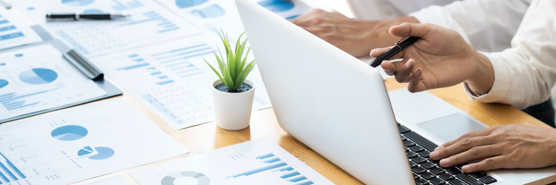 Two business teamwork calculating a valuation in workplace.